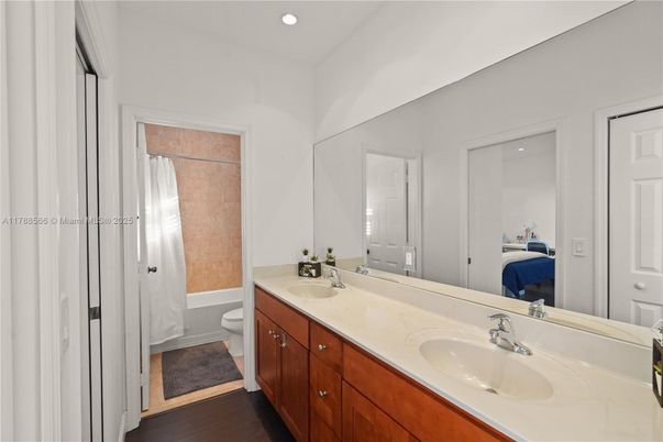 Bathroom, Dual Sink Vanities, Interior, Recessed Lighting, Wood Texture Flooring