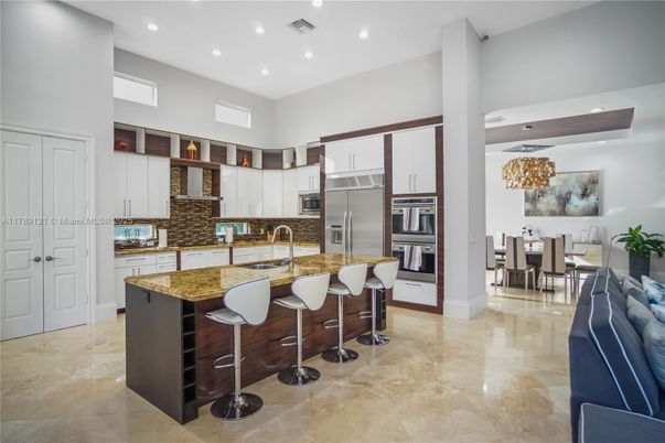 Chandelier, Dining room, Interior, Kitchen, Recessed Lighting, Stainless Steel Appliances