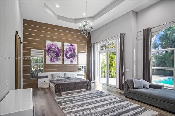 Bedroom, Chandelier, Interior, Recessed Lighting, Wood Texture Flooring, Wooden Walls