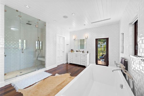 Bathroom, Dual Sink Vanities, Glass Shower, Interior, Recessed Lighting, Wood Texture Flooring