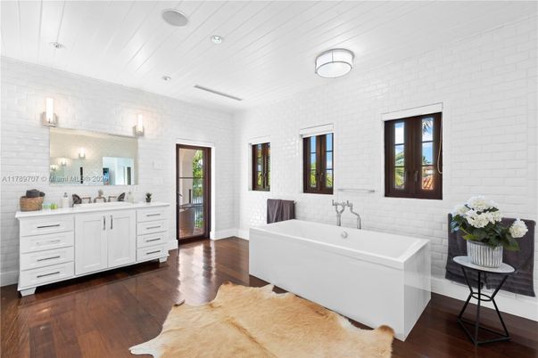 Bathroom, Dual Sink Vanities, Free Standing Baths, Interior, Stone Walls, Wood Texture Flooring