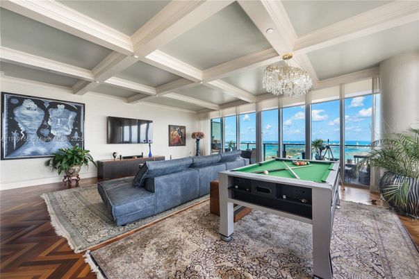Billiard Table, Chandelier, Game Room, Interior, Living room, Recessed Lighting, Water, Wood Texture Flooring