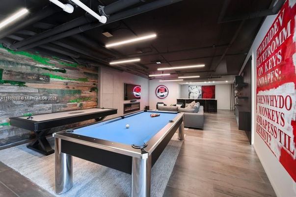 Billiard Table, Game Room, Interior, Recessed Lighting, Stone Walls, Wood Texture Flooring