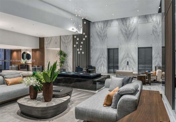 Interior, Living room, Marble, Marble Walls, Pendant Lights, Recessed Lighting, Wood Texture Flooring