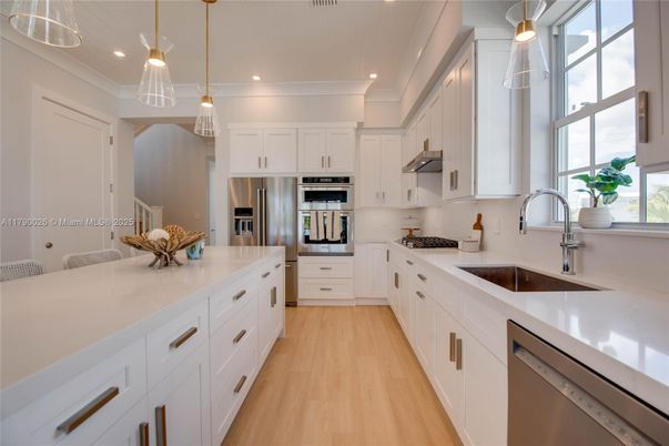 Interior, Kitchen, Pendant Lights, Recessed Lighting, Stainless Steel Appliances, Wood Texture Flooring