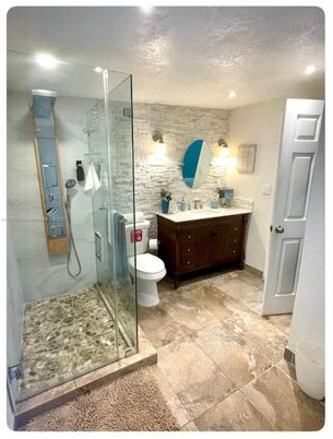 Bathroom, Glass Shower, Interior, Recessed Lighting, Stone Walls