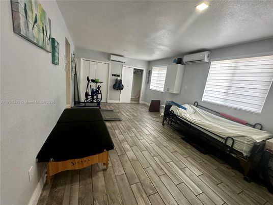 Bedroom, Fitness Equipment, Interior, Recessed Lighting, Wood Texture Flooring