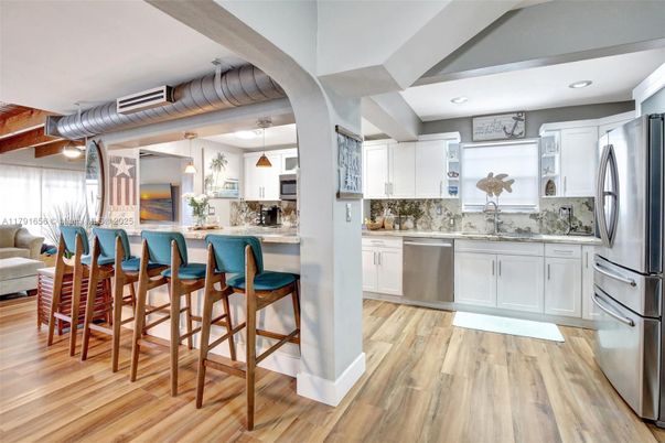 Interior, Kitchen, Pendant Lights, Recessed Lighting, Stainless Steel Appliances, Wood Texture Flooring
