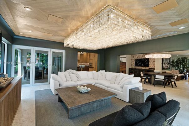 Chandelier, Dining room, Interior, Living room, Pendant Lights, Recessed Lighting, Stone Walls, Wooden Ceilings