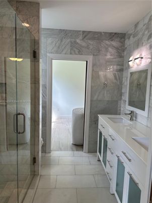 Bathroom, Dual Sink Vanities, Glass Shower, Interior, Marble Walls