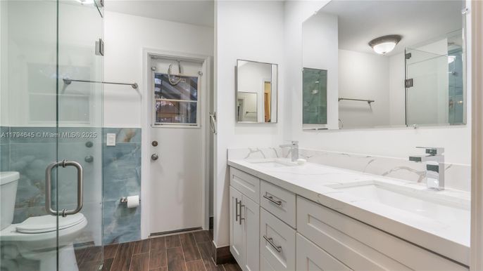Bathroom, Dual Sink Vanities, Glass Shower, Interior, Wood Texture Flooring