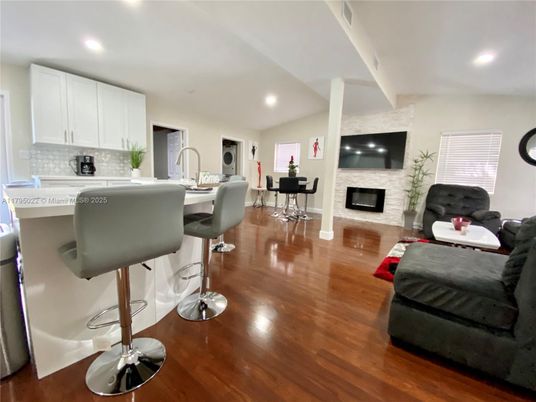 Fireplace, Interior, Kitchen, Recessed Lighting, Wood Texture Flooring