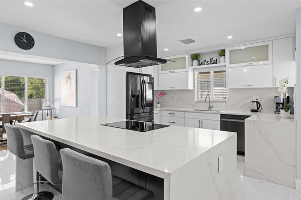 Interior, Kitchen, Marble, Marble Walls, Recessed Lighting, Stainless Steel Appliances