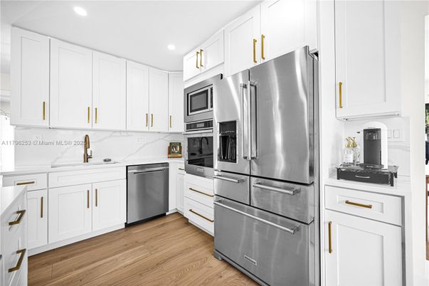 Interior, Kitchen, Recessed Lighting, Stainless Steel Appliances, Wood Texture Flooring