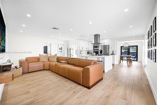 Dining room, Interior, Kitchen, Living room, Pendant Lights, Recessed Lighting, Stainless Steel Appliances, Wood Texture Flooring