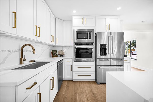 Interior, Kitchen, Recessed Lighting, Stainless Steel Appliances, Wood Texture Flooring