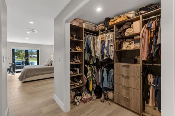 Bedroom, Interior, Recessed Lighting, Walk-in Closets, Wood Texture Flooring