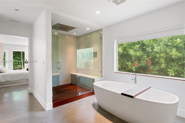 Bathroom, Free Standing Baths, Glass Shower, Interior, Recessed Lighting, Wood Texture Flooring