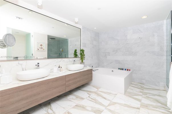 Bathroom, Dual Sink Vanities, Free Standing Baths, Glass Shower, Interior, Marble, Marble Walls, Recessed Lighting