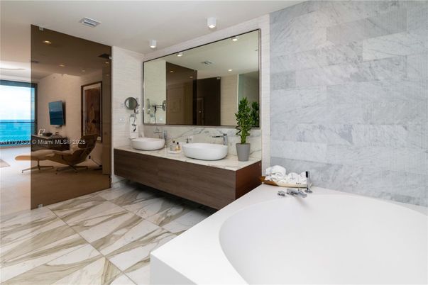 Bathroom, Dual Sink Vanities, Free Standing Baths, Interior, Marble, Marble Walls, Recessed Lighting