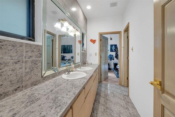 Bathroom, Dual Sink Vanities, Interior, Recessed Lighting, Tile Countertops