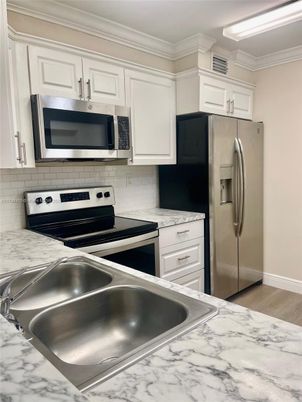 Interior, Kitchen, Stainless Steel Appliances, Wood Texture Flooring