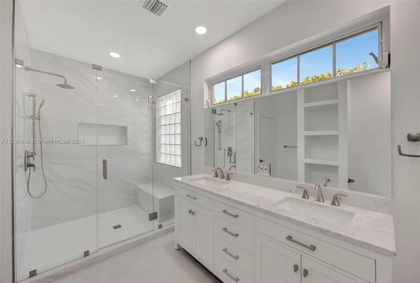 Bathroom, Dual Sink Vanities, Glass Shower, Interior, Marble Walls, Recessed Lighting