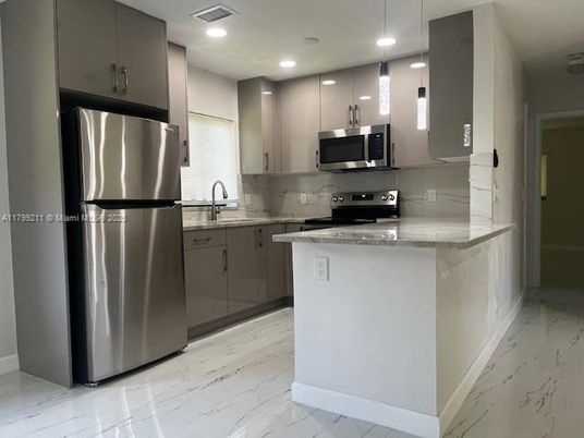 Interior, Kitchen, Marble, Pendant Lights, Recessed Lighting, Stainless Steel Appliances