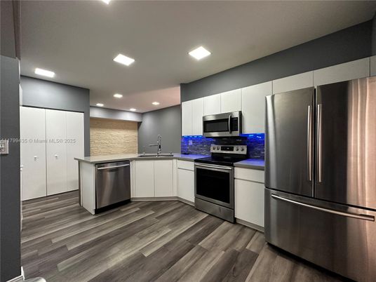 Interior, Kitchen, Recessed Lighting, Stainless Steel Appliances, Wood Texture Flooring
