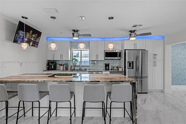 Interior, Kitchen, Marble, Pendant Lights, Stainless Steel Appliances