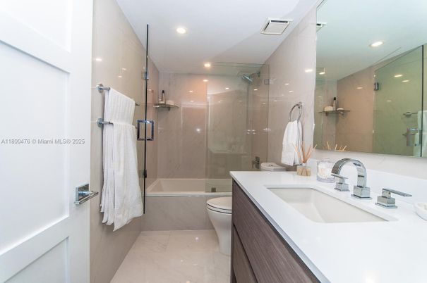 Bathroom, Dual Sink Vanities, Glass Shower, Interior, Marble, Recessed Lighting