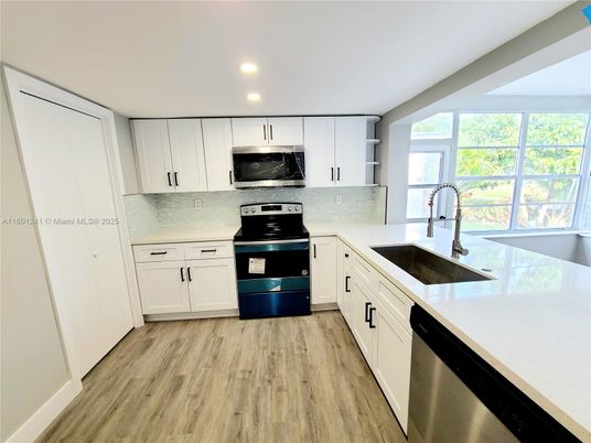 Interior, Kitchen, Recessed Lighting, Stainless Steel Appliances, Wood Texture Flooring
