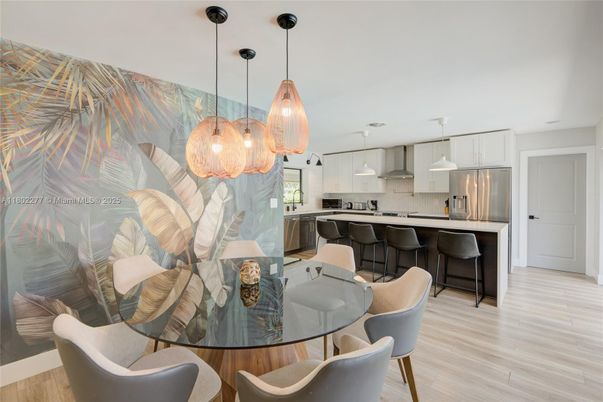 Dining room, Interior, Kitchen, Pendant Lights, Stainless Steel Appliances, Wood Texture Flooring