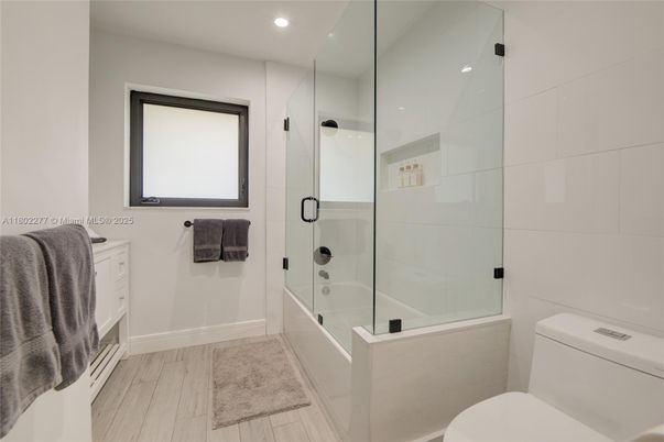 Bathroom, Glass Shower, Interior, Recessed Lighting, Wood Texture Flooring