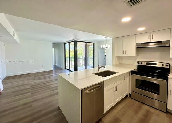 Chandelier, Interior, Kitchen, Recessed Lighting, Stainless Steel Appliances, Wood Texture Flooring