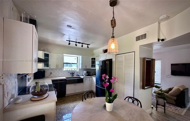 Dining room, Fireplace, Interior, Kitchen, Pendant Lights, Stainless Steel Appliances