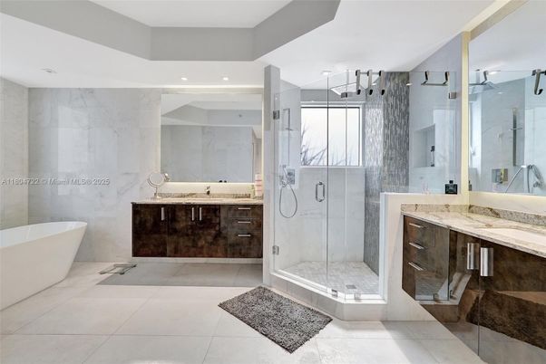 Bathroom, Dual Sink Vanities, Free Standing Baths, Glass Shower, Interior, Marble Walls, Recessed Lighting