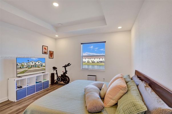 Bedroom, Fitness Equipment, Interior, Recessed Lighting, Wood Texture Flooring