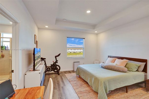 Bedroom, Fitness Equipment, Interior, Recessed Lighting, Wood Texture Flooring