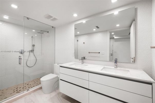 Bathroom, Dual Sink Vanities, Glass Shower, Interior, Marble, Recessed Lighting