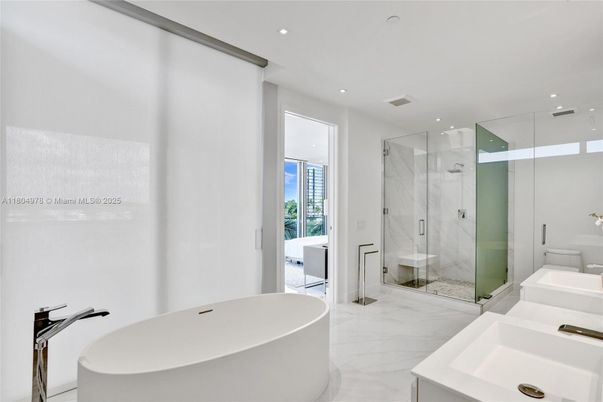 Bathroom, Dual Sink Vanities, Free Standing Baths, Glass Shower, Interior, Marble, Marble Walls, Recessed Lighting