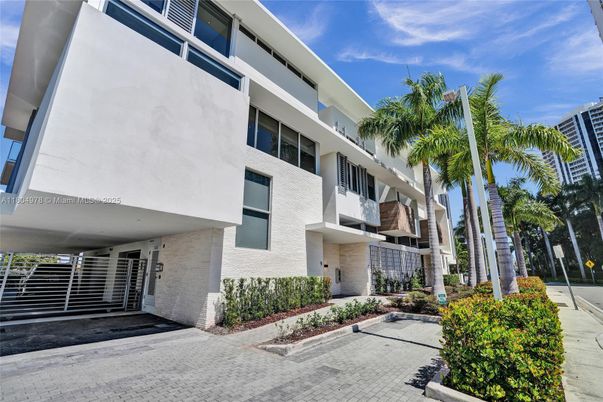 Exterior, Facade, Brick Facade, Condo Building