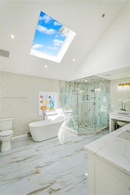 Bathroom, Free Standing Baths, Glass Shower, Interior, Marble, Marble Walls, Recessed Lighting