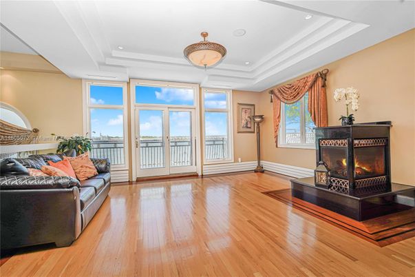 Fireplace, Interior, Recessed Lighting, Water, Wood Texture Flooring