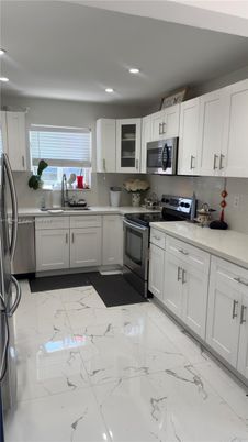 Interior, Kitchen, Marble, Recessed Lighting, Stainless Steel Appliances