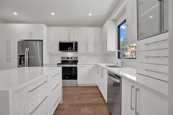 Interior, Kitchen, Recessed Lighting, Stainless Steel Appliances, Wood Texture Flooring