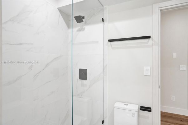 Bathroom, Glass Shower, Interior, Marble Walls, Wood Texture Flooring