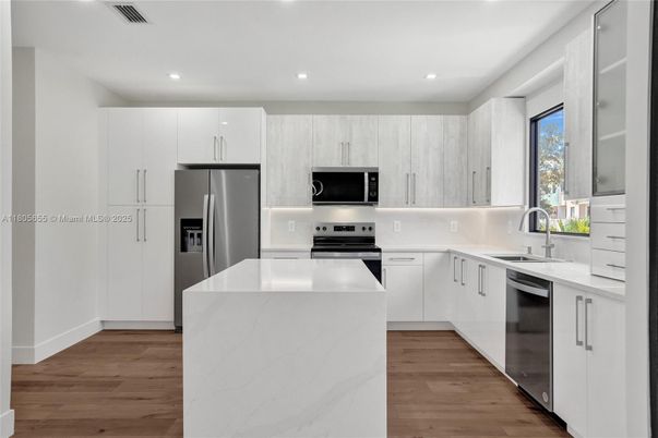 Interior, Kitchen, Recessed Lighting, Stainless Steel Appliances, Wood Texture Flooring