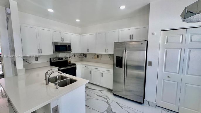 Interior, Kitchen, Marble, Recessed Lighting, Stainless Steel Appliances
