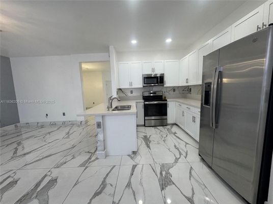 Interior, Kitchen, Marble, Recessed Lighting, Stainless Steel Appliances